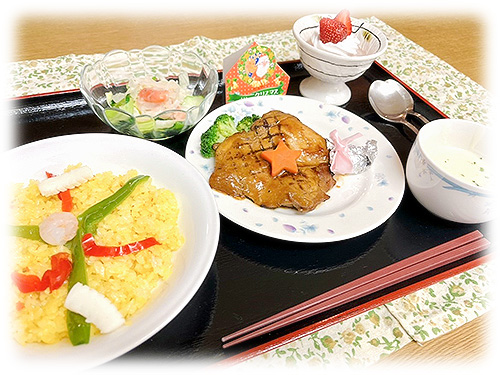 パエリアと骨付きチキン[写真]